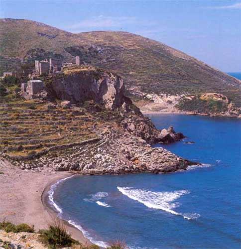 Rocky earth, stone houses, solidly built towers in the coastal village of Kotronas, Mani  KOTRONAS (Village) ANATOLIKI MANI