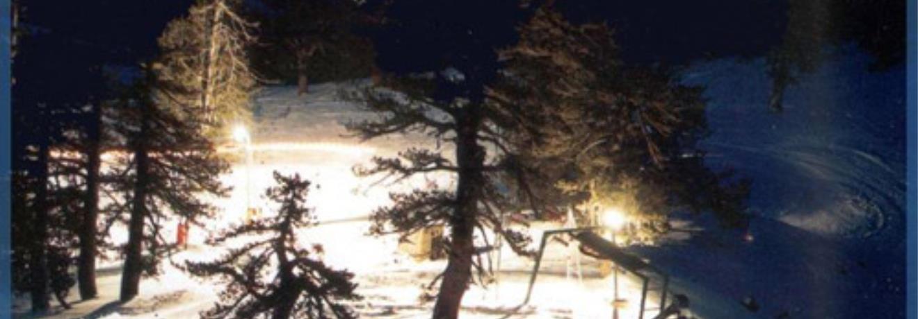 A lit-up slope for night skiing